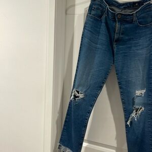 AG brand jeans with holes